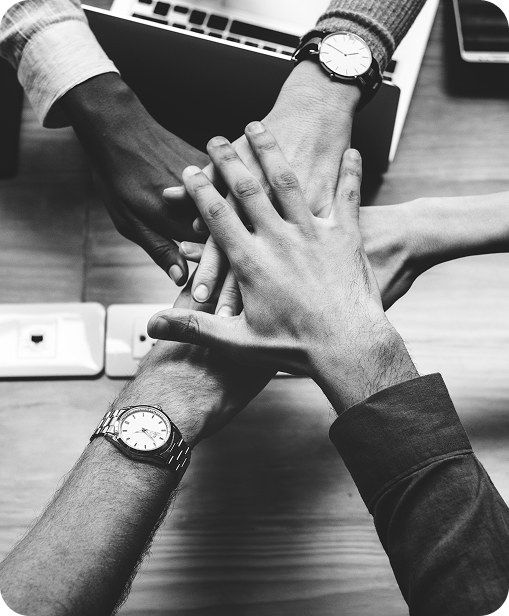 Team hands stacked in unity